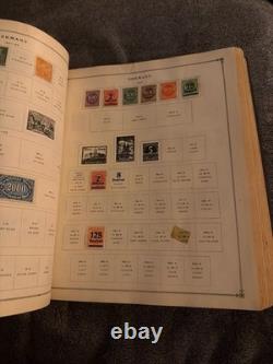 Ancien album de timbres-poste International Junior de 1939 rempli de timbres de collection