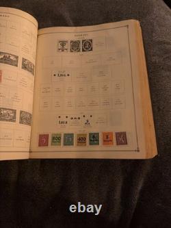 Ancien album de timbres-poste International Junior de 1939 rempli de timbres de collection