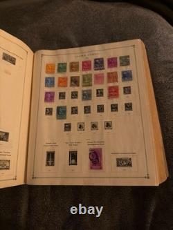 Ancien album de timbres-poste International Junior de 1939 rempli de timbres de collection