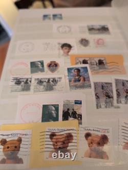 Belle collection de timbres des États-Unis et du monde entier dans un album parfait. À voir / regarder