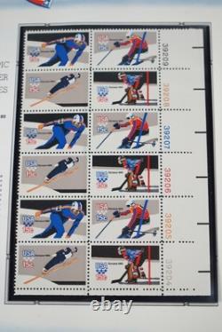 COLLECTION AMÉRICAINE DES ANNÉES 1980 DE PLUS DE 180 BLOCS DE PLAQUE NEUFS VALANT $260 RANGÉS DANS UN ALBUM