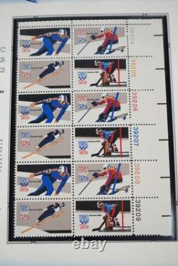 COLLECTION AMÉRICAINE DES ANNÉES 1980 DE PLUS DE 180 BLOCS DE PLAQUE NEUFS VALANT $260 RANGÉS DANS UN ALBUM
