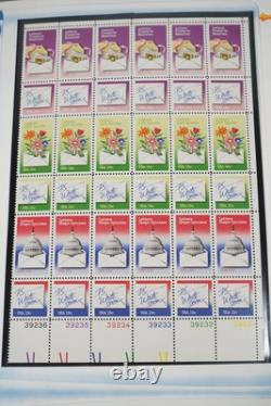 COLLECTION AMÉRICAINE DES ANNÉES 1980 DE PLUS DE 180 BLOCS DE PLAQUE NEUFS VALANT $260 RANGÉS DANS UN ALBUM
