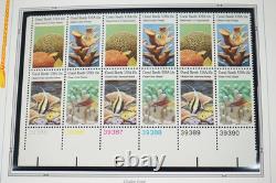 COLLECTION AMÉRICAINE DES ANNÉES 1980 DE PLUS DE 180 BLOCS DE PLAQUE NEUFS VALANT $260 RANGÉS DANS UN ALBUM