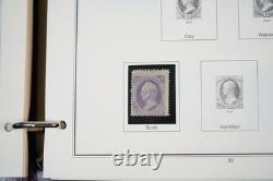 COLLECTION DE TIMBRES AMÉRICAINS DES ANNÉES 1850 À 2001 DE PLUS DE 1000 TIMBRES NEUFS ET USAGÉS STOCKÉS DANS UN ALBUM PATRIMONIAL
