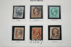 COLLECTION DE TIMBRES AMÉRICAINS DES ANNÉES 1850 À 2001 DE PLUS DE 1000 TIMBRES NEUFS ET USAGÉS STOCKÉS DANS UN ALBUM PATRIMONIAL