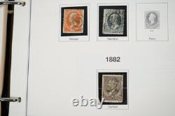 COLLECTION DE TIMBRES AMÉRICAINS DES ANNÉES 1850 À 2001 DE PLUS DE 1000 TIMBRES NEUFS ET USAGÉS STOCKÉS DANS UN ALBUM PATRIMONIAL