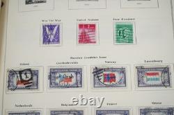 COLLECTION DES ÉTATS-UNIS ET DU MONDE DES ANNÉES 1940 DE PLUS DE 1 200 TIMBRES NEUFS ET USAGÉS DANS UN ALBUM SCOTT