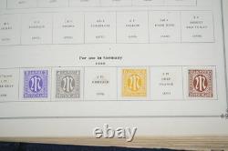 COLLECTION DES ÉTATS-UNIS ET DU MONDE DES ANNÉES 1940 DE PLUS DE 1 200 TIMBRES NEUFS ET USAGÉS DANS UN ALBUM SCOTT