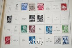 COLLECTION DES ÉTATS-UNIS ET DU MONDE DES ANNÉES 1940 DE PLUS DE 1 200 TIMBRES NEUFS ET USAGÉS DANS UN ALBUM SCOTT