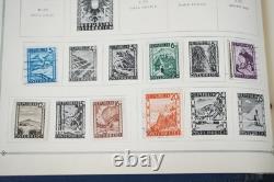 COLLECTION DES ÉTATS-UNIS ET DU MONDE DES ANNÉES 1940 DE PLUS DE 1 200 TIMBRES NEUFS ET USAGÉS DANS UN ALBUM SCOTT