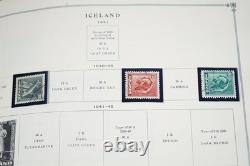 COLLECTION MONDIALE 1900-1970 I/K DE PLUS DE 900 TIMBRES NEUFS ET USAGÉS DANS UN ALBUM SCOTT