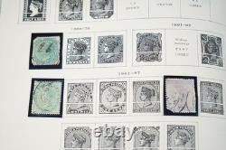 COLLECTION MONDIALE 1900-1970 I/K DE PLUS DE 900 TIMBRES NEUFS ET USAGÉS DANS UN ALBUM SCOTT