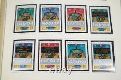 COLLECTION MONDIALE A/Z DES ANNÉES 1980 DE PLUS DE 625 TIMBRES D'IMPORTANCE MAJORITAIREMENT NEUFS CONSERVÉS DANS UN ALBUM SCOTT