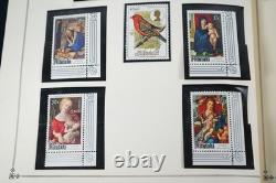 COLLECTION MONDIALE A/Z DES ANNÉES 1980 DE PLUS DE 625 TIMBRES D'IMPORTANCE MAJORITAIREMENT NEUFS CONSERVÉS DANS UN ALBUM SCOTT