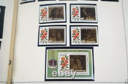 COLLECTION MONDIALE A/Z DES ANNÉES 1980 DE PLUS DE 625 TIMBRES D'IMPORTANCE MAJORITAIREMENT NEUFS CONSERVÉS DANS UN ALBUM SCOTT