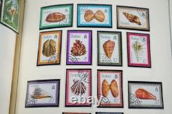 COLLECTION MONDIALE A/Z DES ANNÉES 1980 DE PLUS DE 625 TIMBRES D'IMPORTANCE MAJORITAIREMENT NEUFS CONSERVÉS DANS UN ALBUM SCOTT