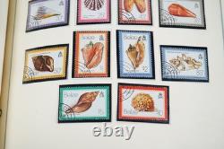 COLLECTION MONDIALE A/Z DES ANNÉES 1980 DE PLUS DE 625 TIMBRES D'IMPORTANCE MAJORITAIREMENT NEUFS CONSERVÉS DANS UN ALBUM SCOTT