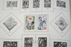 COLLECTION MONDIALE D-G 1870-1970 DE PLUS DE 5000 TIMBRES NEUFS ET USAGÉS DANS UN ALBUM MINKUS