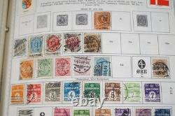 COLLECTION MONDIALE D-G 1870-1970 DE PLUS DE 5000 TIMBRES NEUFS ET USAGÉS DANS UN ALBUM MINKUS