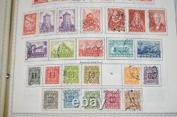 COLLECTION MONDIALE D-G 1870-1970 DE PLUS DE 5000 TIMBRES NEUFS ET USAGÉS DANS UN ALBUM MINKUS