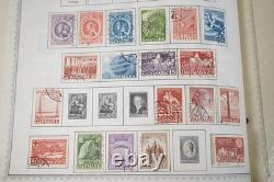 COLLECTION MONDIALE D-G 1870-1970 DE PLUS DE 5000 TIMBRES NEUFS ET USAGÉS DANS UN ALBUM MINKUS