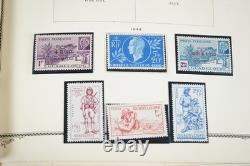 COLLECTION MONDIALE DE PLUS DE 5 600 TIMBRES DES ANNÉES 1890 AUX ANNÉES 1990, NEUFS ET OBLITÉRÉS, DANS UN ALBUM HARRIS