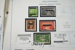 COLLECTION MONDIALE DE PLUS DE 7 000 TIMBRES DES ANNÉES 1860 AUX ANNÉES 1980, NEUFS ET OBLITÉRÉS, DANS UN ALBUM HARRIS