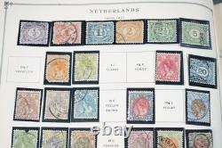 COLLECTION MONDIALE DE TIMBRES 1860-1960 DE 650 TIMBRES NEUFS ET USAGÉS DANS UN ALBUM SCOTT