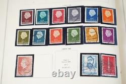 COLLECTION MONDIALE DE TIMBRES 1860-1960 DE 650 TIMBRES NEUFS ET USAGÉS DANS UN ALBUM SCOTT