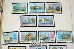 COLLECTION MONDIALE DE TIMBRES A/V DES ANNÉES 1970 DE PLUS DE 600 TIMBRES PRINCIPALEMENT NEUFS RANGÉS DANS UN ALBUM SCOTT