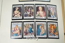 COLLECTION MONDIALE DE TIMBRES A/V DES ANNÉES 1970 DE PLUS DE 600 TIMBRES PRINCIPALEMENT NEUFS RANGÉS DANS UN ALBUM SCOTT