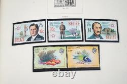 COLLECTION MONDIALE DE TIMBRES A/V DES ANNÉES 1970 DE PLUS DE 600 TIMBRES PRINCIPALEMENT NEUFS RANGÉS DANS UN ALBUM SCOTT