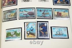 COLLECTION MONDIALE DE TIMBRES A/V DES ANNÉES 1970 DE PLUS DE 600 TIMBRES PRINCIPALEMENT NEUFS RANGÉS DANS UN ALBUM SCOTT