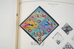 COLLECTION MONDIALE DE TIMBRES A/V DES ANNÉES 1970 DE PLUS DE 600 TIMBRES PRINCIPALEMENT NEUFS RANGÉS DANS UN ALBUM SCOTT