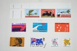 COLLECTION MONDIALE DE TIMBRES DES ANNÉES 1920 À 1970, PLUS DE 850 TIMBRES NEUFS ET USAGÉS STOCKÉS DANS UN ALBUM A-K