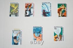COLLECTION MONDIALE DE TIMBRES DES ANNÉES 1920 À 1970, PLUS DE 850 TIMBRES NEUFS ET USAGÉS STOCKÉS DANS UN ALBUM A-K