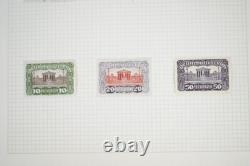 COLLECTION MONDIALE DE TIMBRES DES ANNÉES 1920 À 1970, PLUS DE 850 TIMBRES NEUFS ET USAGÉS STOCKÉS DANS UN ALBUM A-K