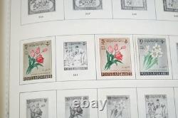 COLLECTION MONDIALE DES ANNÉES 1930-1960 DE PLUS DE 4 500 TIMBRES NEUFS ET OBLITÉRÉS DANS UN ALBUM MINKUS