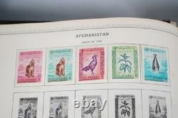 COLLECTION MONDIALE DES ANNÉES 1930-1960 DE PLUS DE 4 500 TIMBRES NEUFS ET OBLITÉRÉS DANS UN ALBUM MINKUS