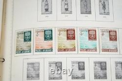 COLLECTION MONDIALE DES ANNÉES 1930-1960 DE PLUS DE 4 500 TIMBRES NEUFS ET OBLITÉRÉS DANS UN ALBUM MINKUS