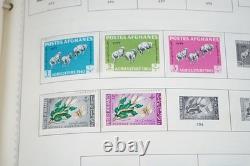 COLLECTION MONDIALE DES ANNÉES 1930-1960 DE PLUS DE 4 500 TIMBRES NEUFS ET OBLITÉRÉS DANS UN ALBUM MINKUS