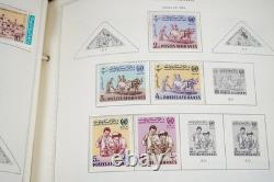 COLLECTION MONDIALE DES ANNÉES 1930-1960 DE PLUS DE 4 500 TIMBRES NEUFS ET OBLITÉRÉS DANS UN ALBUM MINKUS