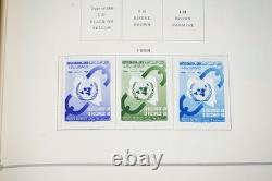 COLLECTION MONDIALE K-M 1910-1970 DE PLUS DE 2 750 TIMBRES NEUFS ET USAGÉS DANS UN ALBUM