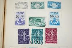 COLLECTION MONDIALE K-M 1910-1970 DE PLUS DE 2 750 TIMBRES NEUFS ET USAGÉS DANS UN ALBUM