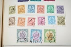 COLLECTION MONDIALE K-M 1910-1970 DE PLUS DE 2 750 TIMBRES NEUFS ET USAGÉS DANS UN ALBUM