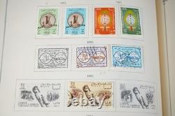 COLLECTION MONDIALE K-M 1910-1970 DE PLUS DE 2 750 TIMBRES NEUFS ET USAGÉS DANS UN ALBUM