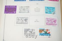 COLLECTION MONDIALE K-M 1910-1970 DE PLUS DE 2 750 TIMBRES NEUFS ET USAGÉS DANS UN ALBUM