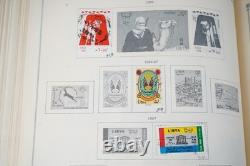 COLLECTION MONDIALE K-M 1910-1970 DE PLUS DE 2 750 TIMBRES NEUFS ET USAGÉS DANS UN ALBUM