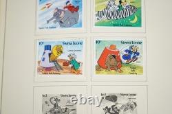 COLLECTION MONDIALE S-Z 1940s-1980s DE PLUS DE 3000 TIMBRES NEUFS ET USAGÉS DANS UN ALBUM SCOTT